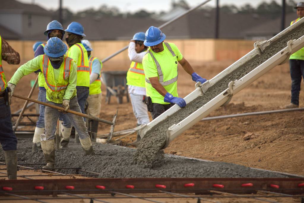 Clear construction team working together on a concrete placement project in Texas