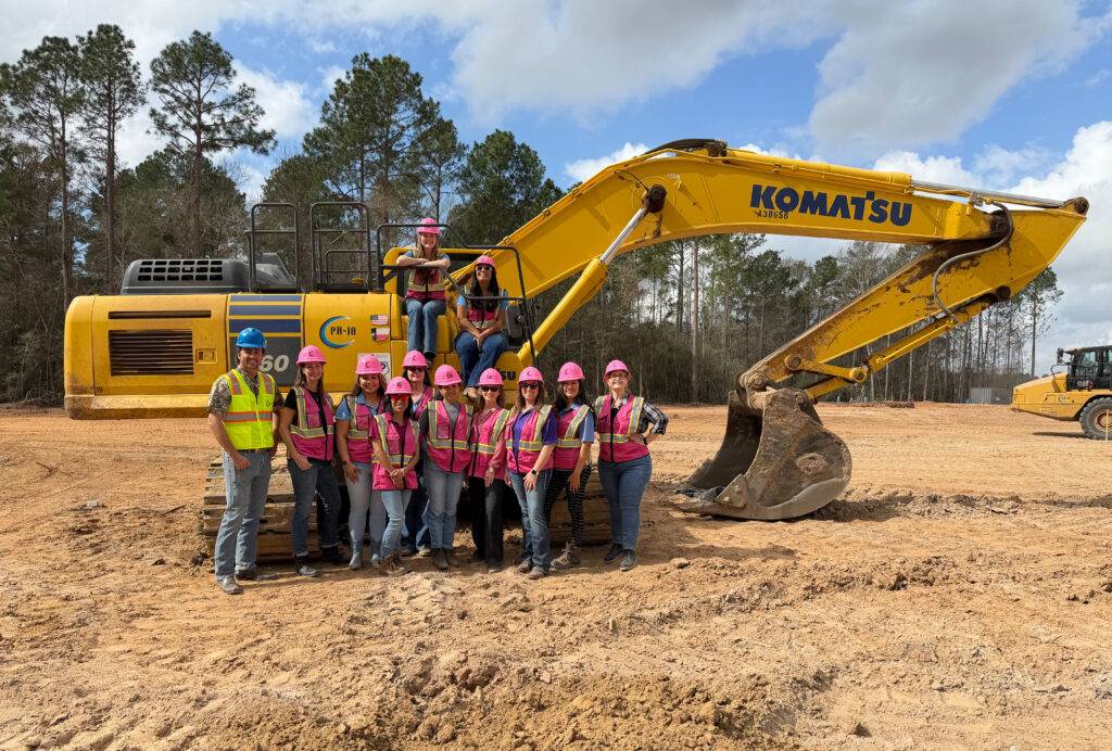 Clear construction team demonstrating company culture and teamwork on a Texas jobsite