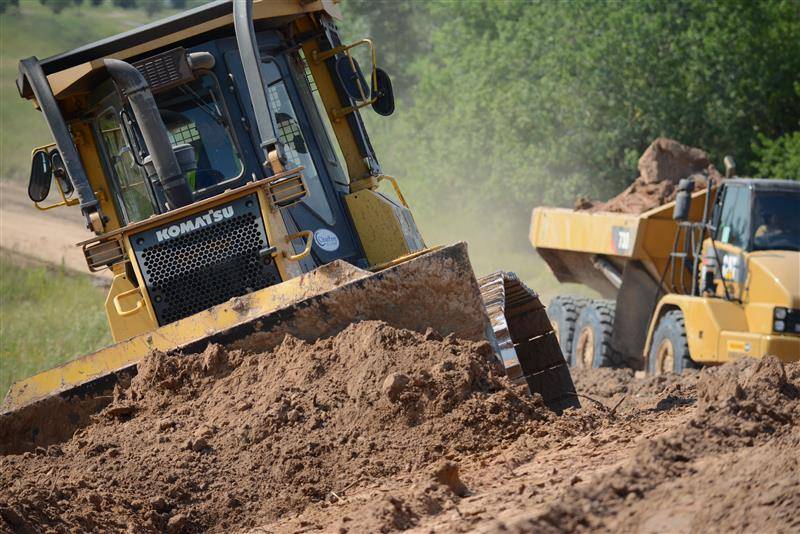 Construction crews performing turnkey site development and infrastructure services in Texas