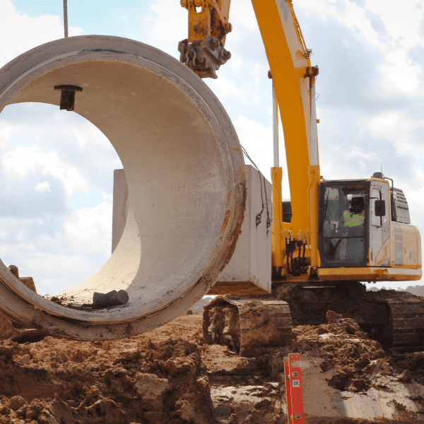 Installation of precast storm drainage infrastructure for a commercial site development project in Texas