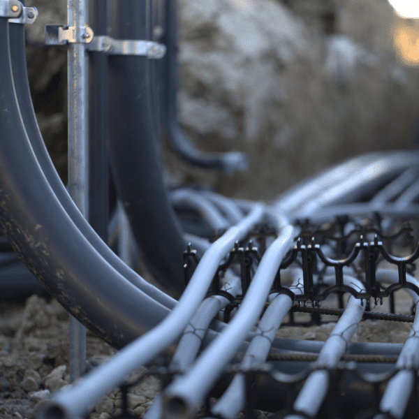 Underground electrical conduit installation for commercial site infrastructure in Texas