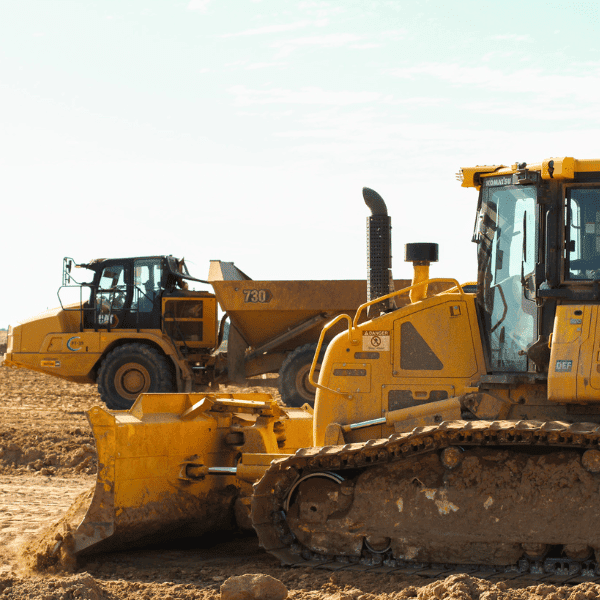 Heavy construction equipment supporting residential, commercial, municipal, and industrial site development projects across Texas